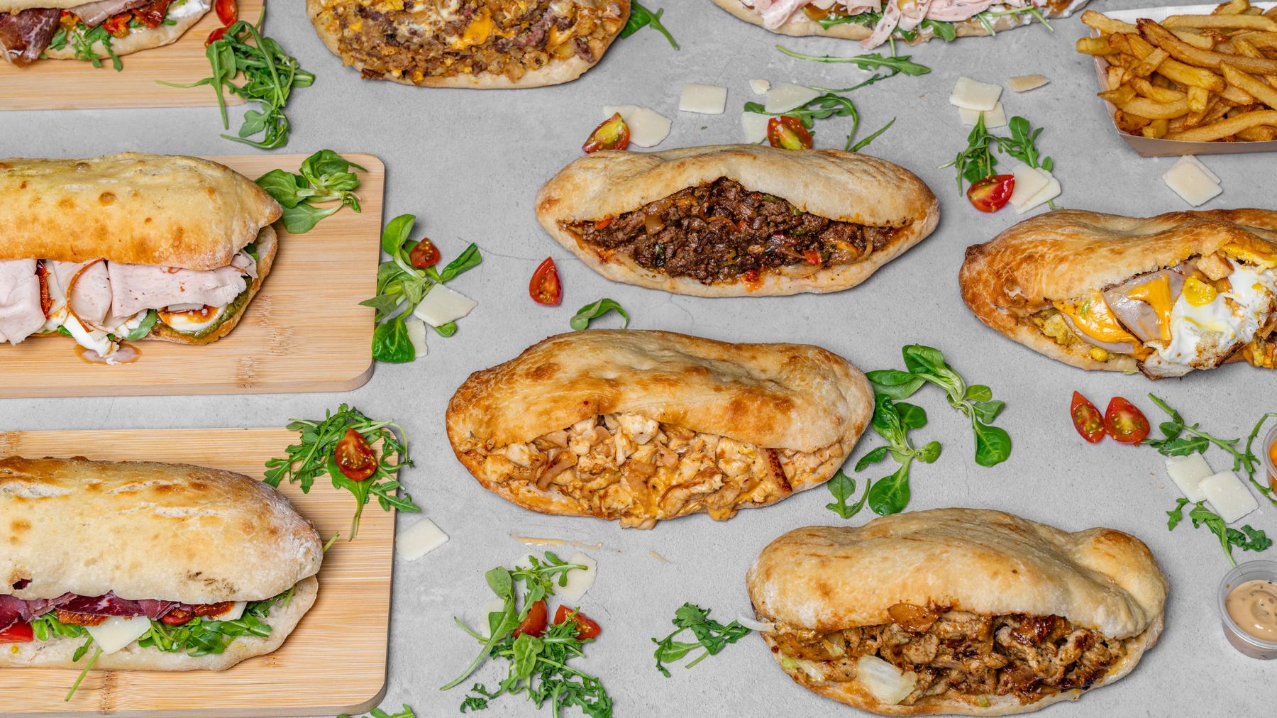 Panuozzos garnis de charcuterie italienne, roquette et stracciatella